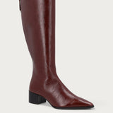 Knee-high heeled boots in burgundy polished leather