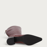 Knee-high heeled boots in burgundy polished leather