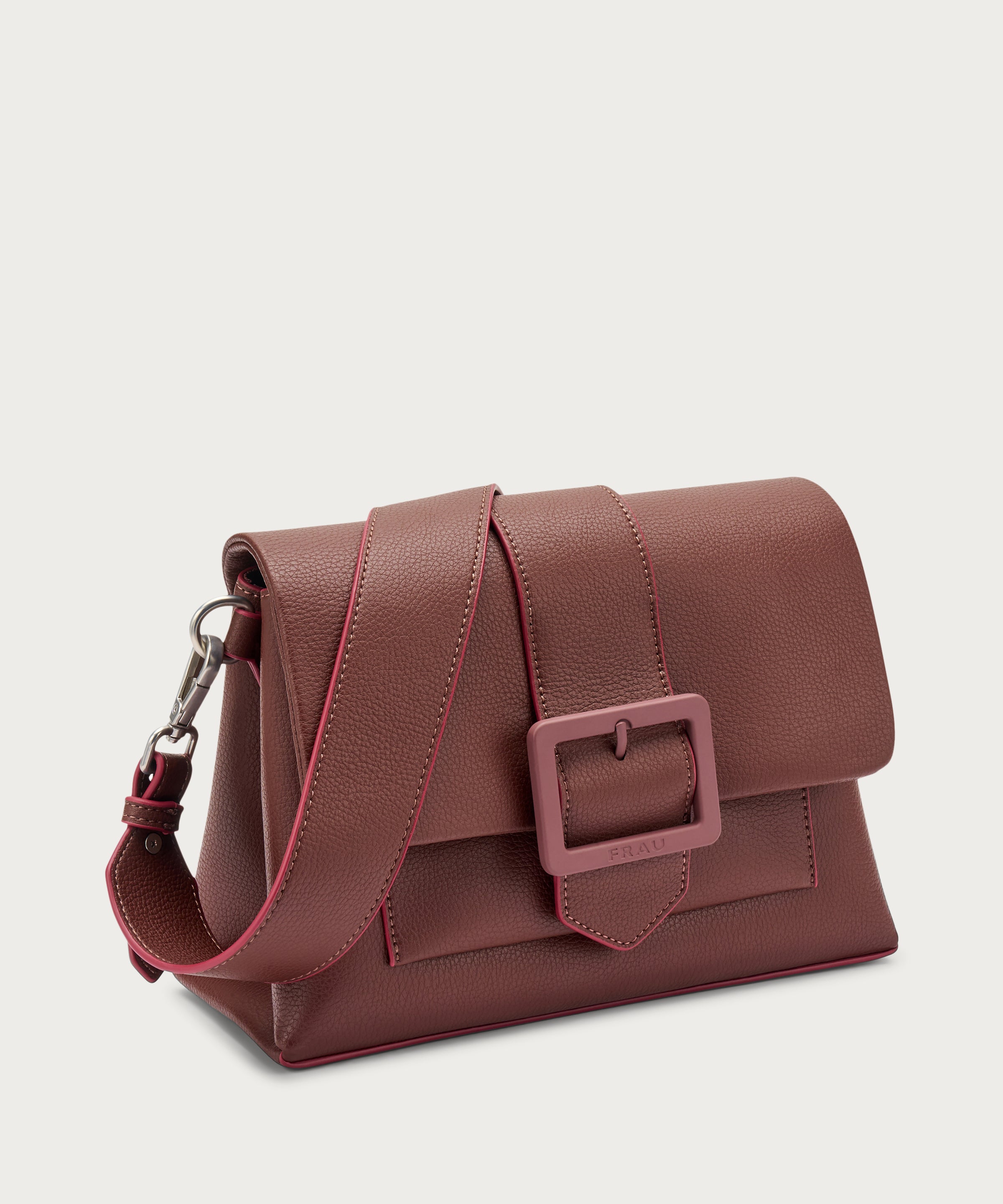 Small shoulder bag in burgundy synthetic material